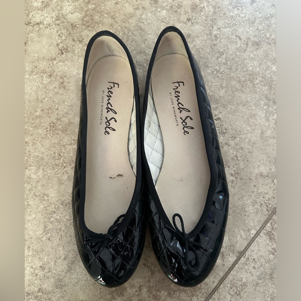 Black quilted ballet flats